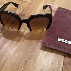 Miu Miu Black Sunglasses with Brown Gradient Lenses